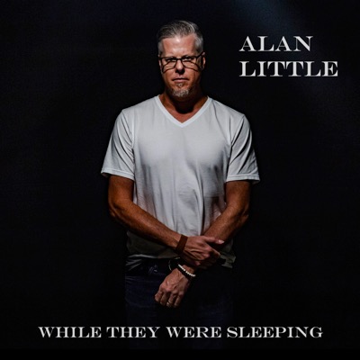 Alan Little While They Were Sleeping album cover shows a picture of Alan wearing a white tee shirt